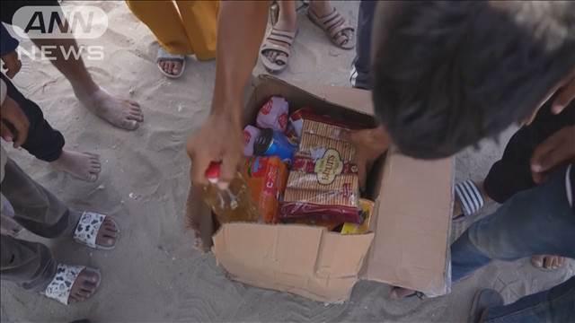 ガザで物資配給再開に住民殺到　イスラエルが警告射撃