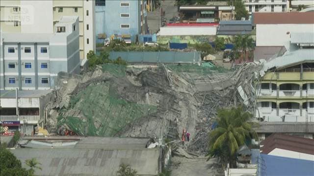 建設中のビル倒壊　2人死亡　18人閉じ込めか フィリピン　